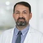 Д-р Mehmet Kınacı