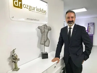 Dr Dr Özgür Koldaş