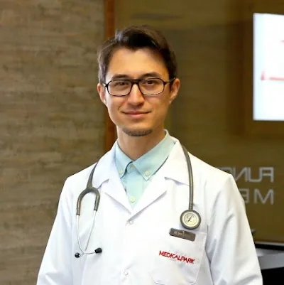 Д-р Kerem Korkut