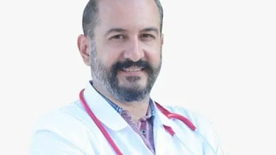Dr. KADİR ORTAKÖYLÜ